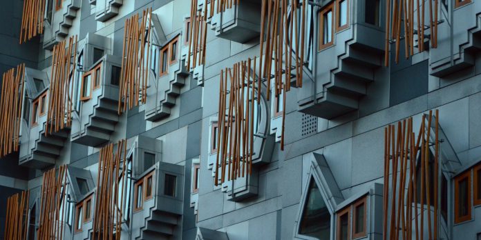 scottish-parliament-exterior-chris-flexen-unsplash Exterior of the Scottish Parliament Building in Holyrood, Edinburgh.